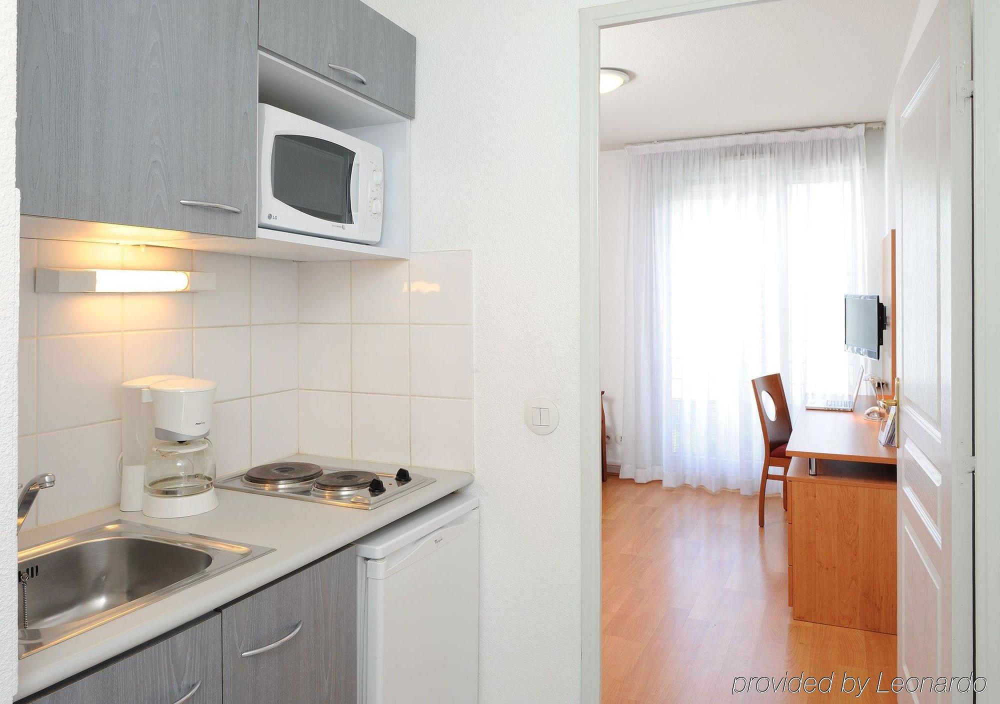 Sejours & Affaires Lyon Park Lane Lião Quarto foto